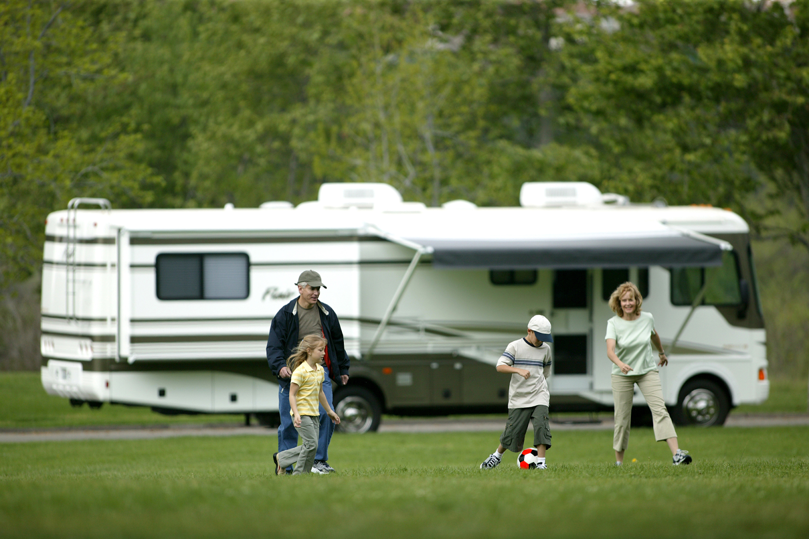 Family Playing By Trailer Rental