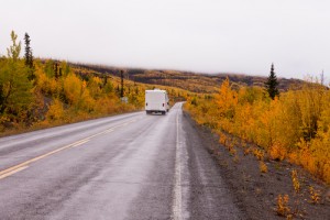 RV on road in autumn