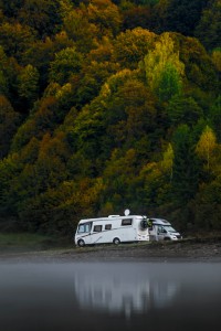 RV on road in autumn