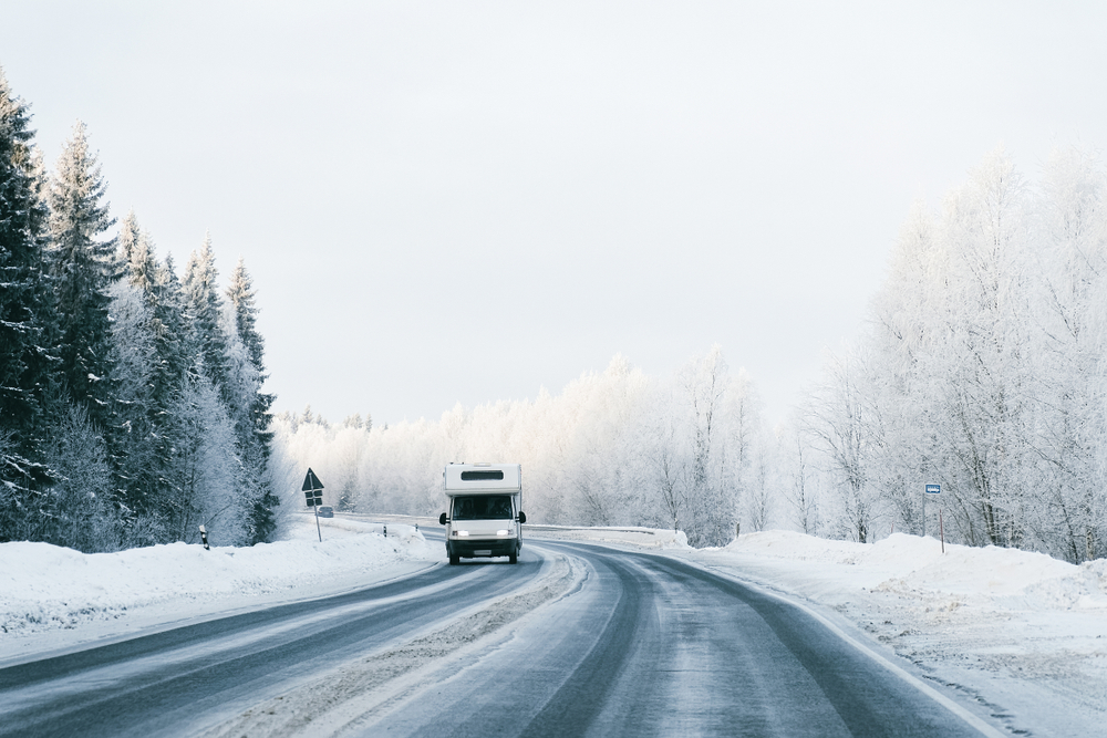 rv on open road in winter