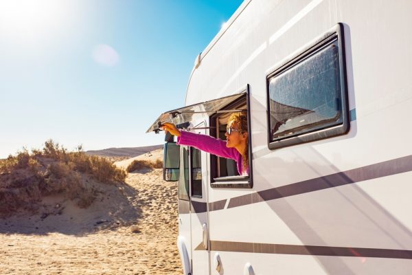 woman opens camper window