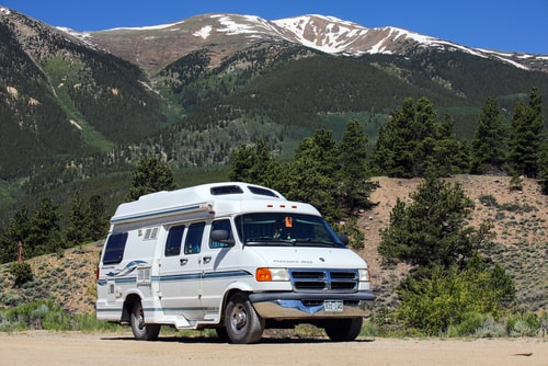 Class B RV in front on mountains