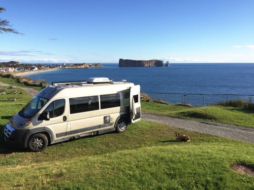 Class B RV in front of the ocean. 