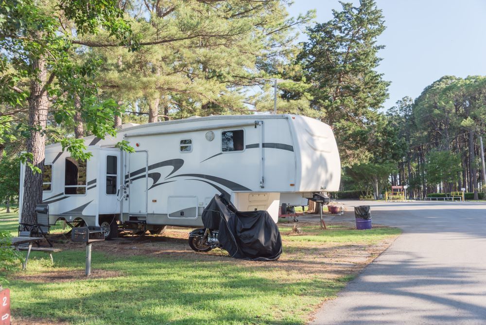 trailer rv parked at camp site