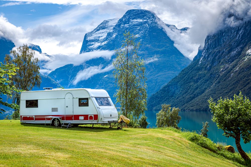 travel trailer rv at rv site in mountains